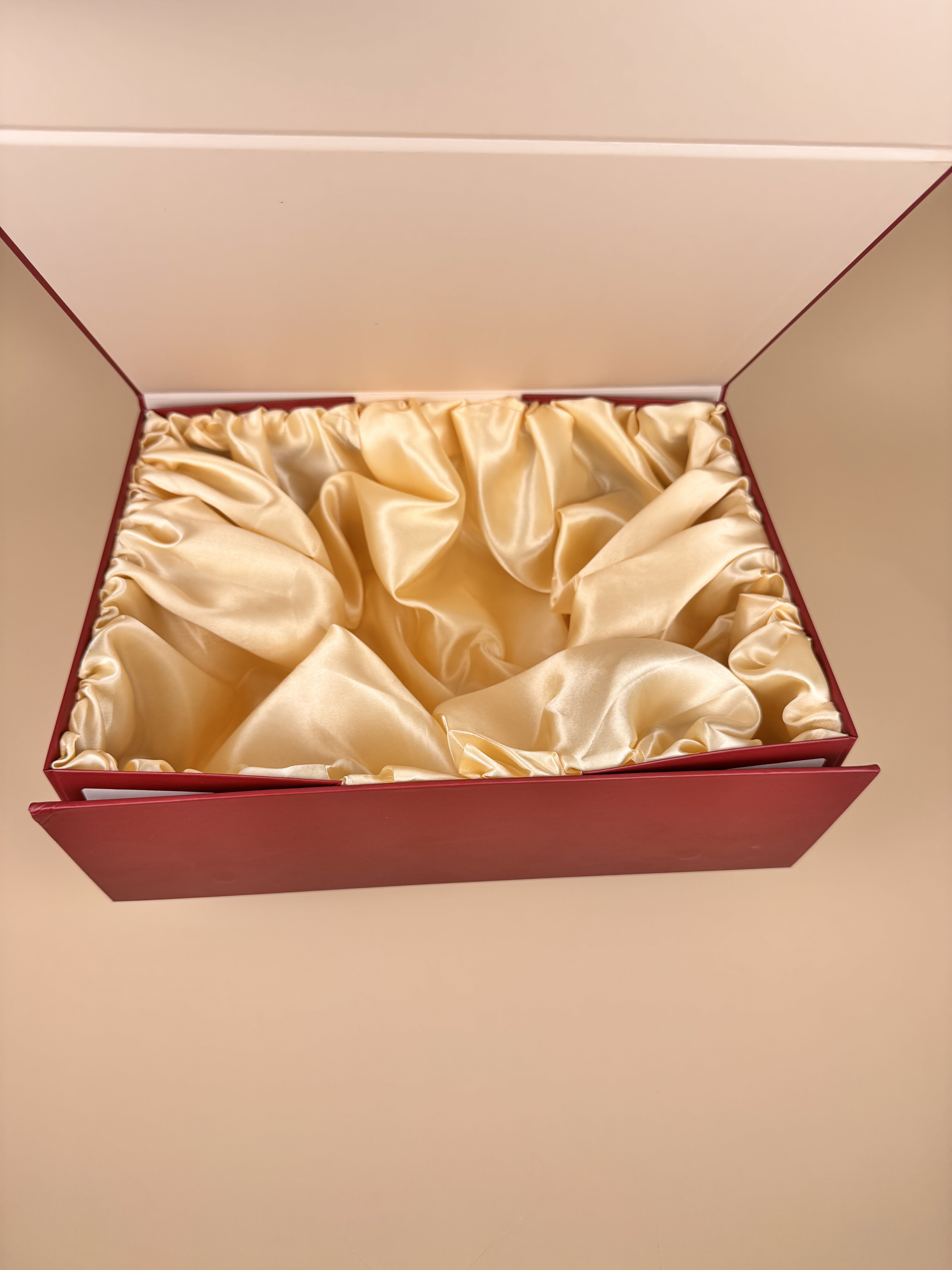 AA WIGS packaging box open revealing champagne satin interior